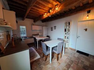 Kuchyň nebo kuchyňský kout v ubytování B&B Ca Rossa + 37 fotografií
