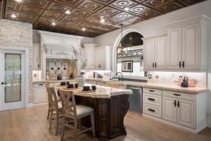 a large kitchen with white cabinets and a coffered ceiling at Two Separate Game Rooms, Heated Pool, Spa, B-ball Court in Mesa