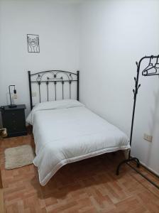 Posteľ alebo postele v izbe v ubytovaní Apartamento O Vento