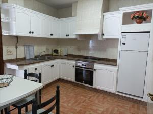 Kuchyňa alebo kuchynka v ubytovaní Apartamento O Vento