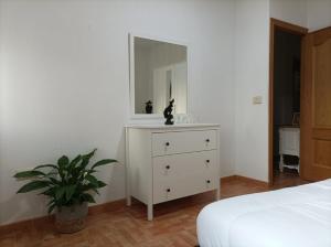 Posteľ alebo postele v izbe v ubytovaní Apartamento O Vento