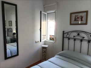 Posteľ alebo postele v izbe v ubytovaní Apartamento O Vento