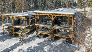 an aerial view of a house in the snow at Latitude Adjustment in Whitefish