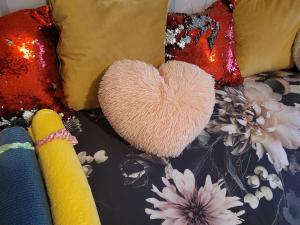 a cushion with a heart on top at Chocolates&Flowers in Leverstock Green