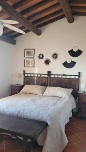 Posteľ alebo postele v izbe v ubytovaní Agriturismo Villa Carducci