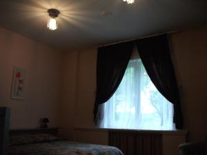 Postel nebo postele na pokoji v ubytování Daugavkrasti Hotel
