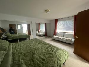 Ένα ή περισσότερα κρεβάτια σε δωμάτιο στο Perfect Brownspoint Getaway-2