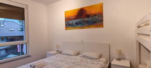 Katil atau katil-katil dalam bilik di Apartma Valan +6 gambar