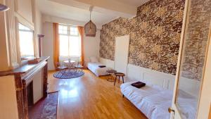 Posezení v ubytování Grand Apt 130m2 vue place ducale
