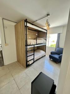 Cama ou camas em um quarto em ZAG Coliving Punta del este