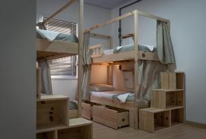 Postel nebo postele na pokoji v ubytování Araucária Hostel e Pousada + 57 fotografií