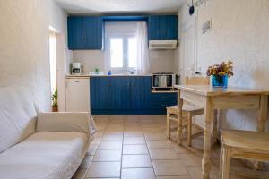 Η κουζίνα ή μικρή κουζίνα στο Cristina Apartments