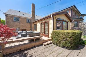 a home with a patio and a house at Urban Oasis - Kid Friendly - Quiet Street in Skokie