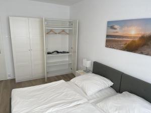 Krevet ili kreveti u jedinici u okviru objekta Gemütliches Apartment in Duisburg