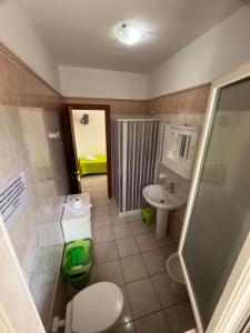 Ванная комната в Villa Angela case vacanza