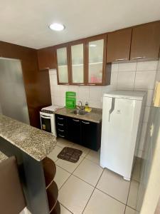 A cozinha ou cozinha compacta de TerraçosAtlantico11FS