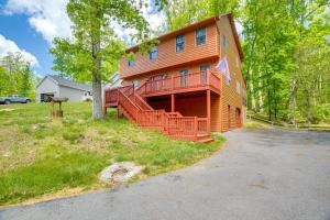 a large house with a deck on the side of it at McGaheysville Home with Screened Porch and Gas Grill! in McGaheysville