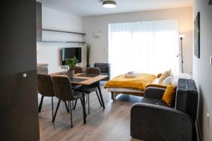 Posezení v ubytování Kinga apartman + 35 fotografií
