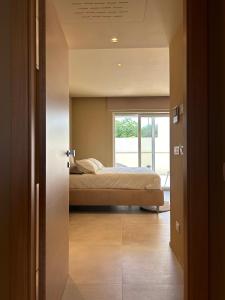 Postel nebo postele na pokoji v ubytování golden suites 2
