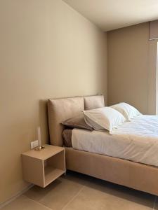 Postel nebo postele na pokoji v ubytování golden suites 2