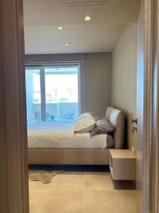 Postel nebo postele na pokoji v ubytování golden suites 2