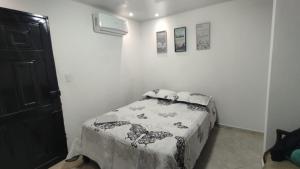 Katil atau katil-katil dalam bilik di El Hogar de Ami