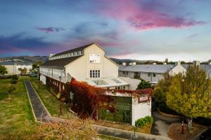 an aerial view of a building in a city at Jailhouse Accommodation in Christchurch