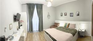 Posteľ alebo postele v izbe v ubytovaní Monti49 GuestHouse
