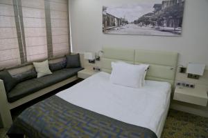 Postel nebo postele na pokoji v ubytování Hotel Svilena