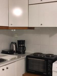 Η κουζίνα ή μικρή κουζίνα στο Cozy 4th floor 2-Spaced apartment with balcony