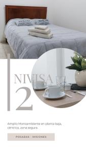 Edificio NIVISA客房内的一张或多张床位