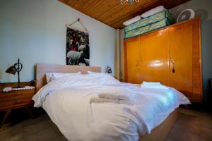 Postel nebo postele na pokoji v ubytování Vila Voula