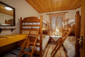 Postel nebo postele na pokoji v ubytování Vila Voula
