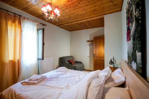 Postel nebo postele na pokoji v ubytování Vila Voula