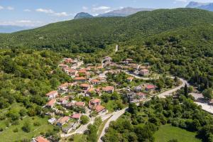 an aerial view of a village in the mountains at Vila Voula in Aristi