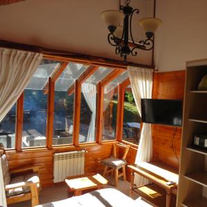 Posezení v ubytování Cabaña Aires Del Manzano