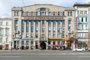 a large building on a street in a city at RA Nevsky 44 in Saint Petersburg