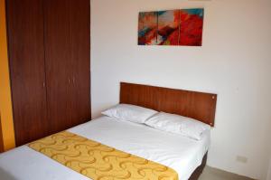 Postel nebo postele na pokoji v ubytování Hotel Tropico Real Mesitas