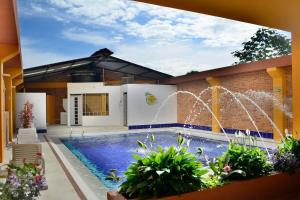 Bazén v ubytování Hotel Tropico Real Mesitas nebo v jeho okolí