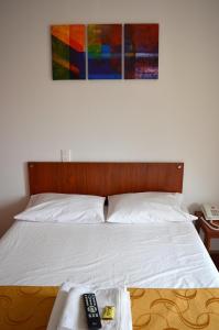 Postel nebo postele na pokoji v ubytování Hotel Tropico Real Mesitas