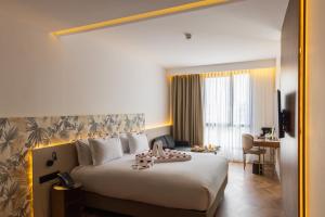 DIAGONAL HOTEL客房内的一张或多张床位