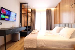 Postel nebo postele na pokoji v ubytování Ionian's Breeze Hotel