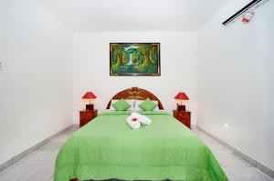 Cama o camas de una habitación en Jiva Bungalow