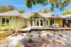 a house with a porch and a yard at 13 Green Winged Teal in Fernandina Beach