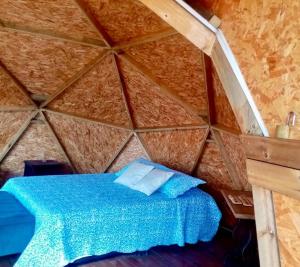 Voodi või voodid majutusasutuse GLAMPING ASTRODOME EN PACHO toas