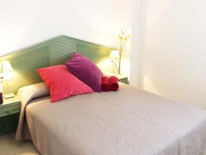 Postel nebo postele na pokoji v ubytování Apartamentos Amatista Unitursa