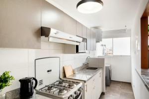 Köök või kööginurk majutusasutuses LINDA HABITACION PRIVADA EN PUEBLO LIBRE