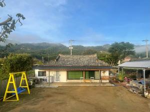 a small house with a roof with at Stay Moon Charm in Gyeongju