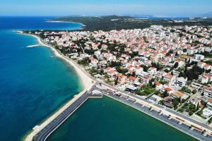 an aerial view of a city and the ocean at Apartments by the sea Novalja, Pag - 18154 in Novalja
