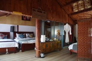 Jayden NAXI Healing Lodge臣安纳西疗愈小院 - Namaste客房内的一张或多张床位